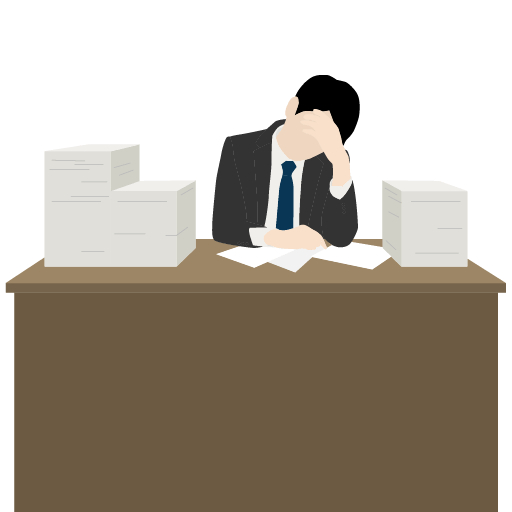 デスクで悩むサラリーマン